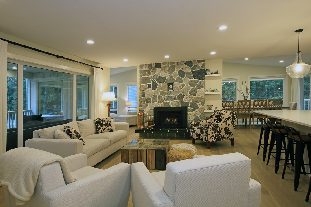 After - Living room with original stone fireplace