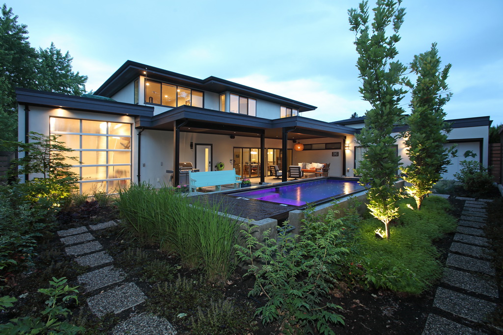 Image of Balfour backyard at dusk with inground pool.